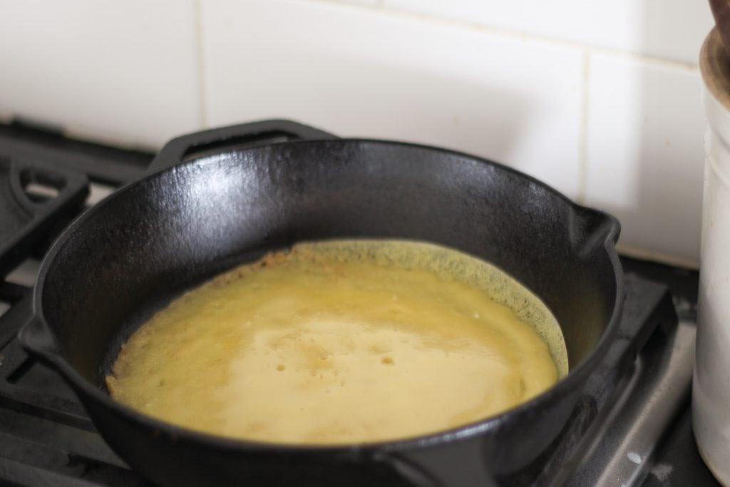crepe with crispy edges in skillet