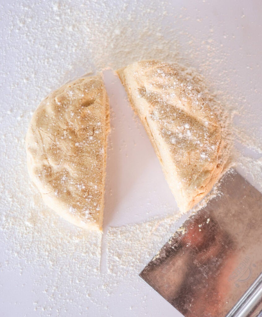 sourdough pie crust dough cut in half.