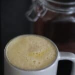 creamy egg yolk coffee in mug.
