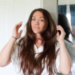 woman with long layered haircut