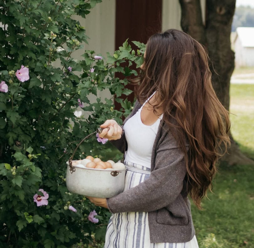 woman with long layered hair