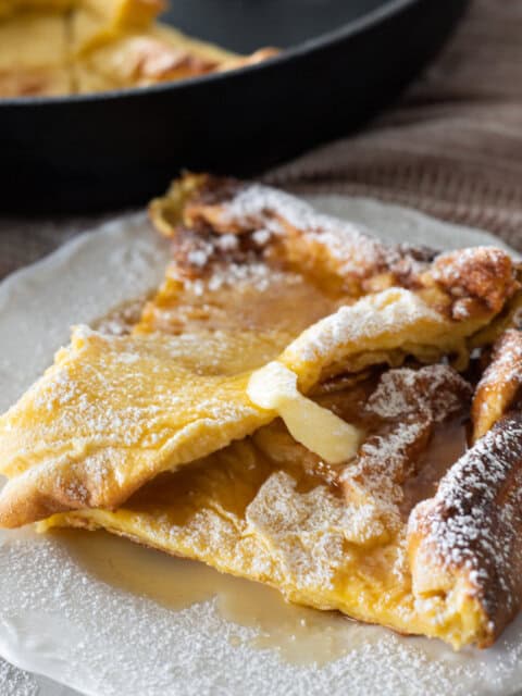 german pancake with butter and maple syrup