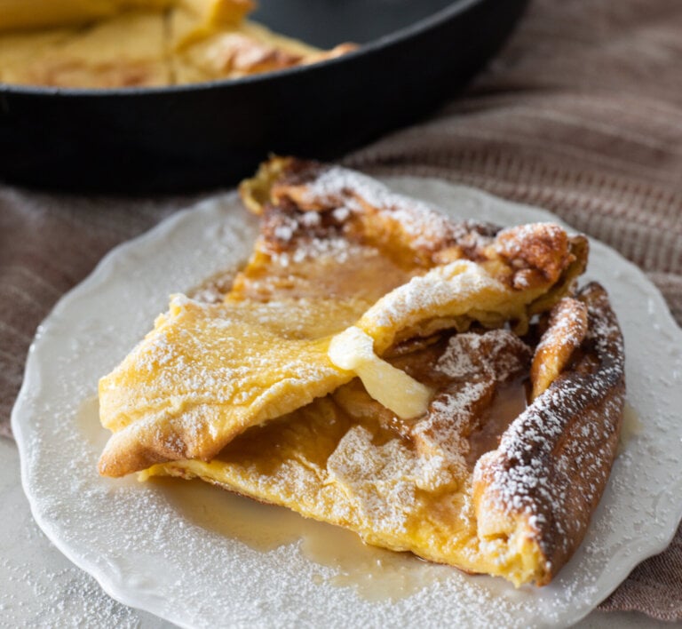 german pancake with butter and maple syrup