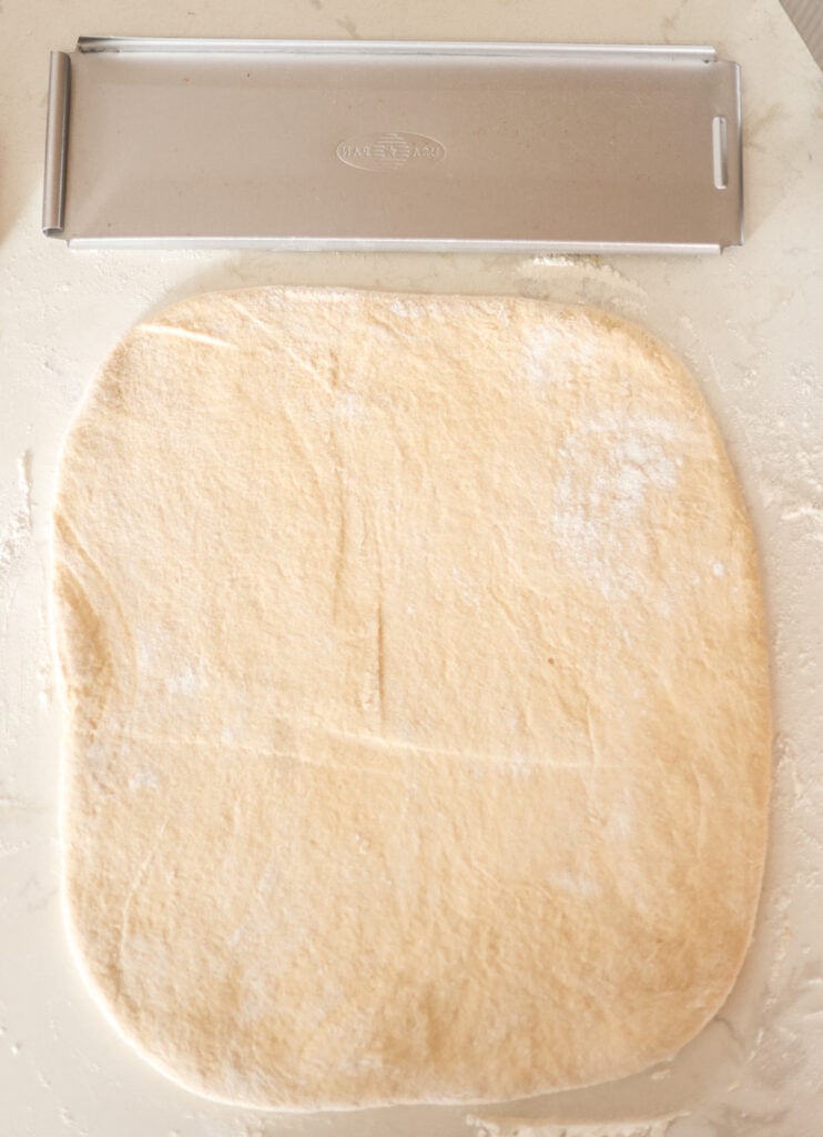 pullman loaf dough rolled into 13 inch rectangle.