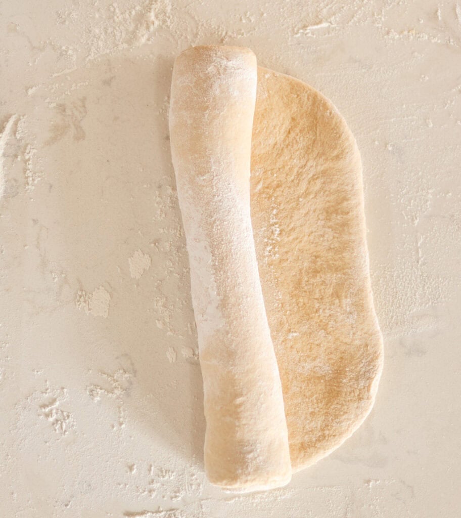 pullman loaf dough rolled into 13 inch log.