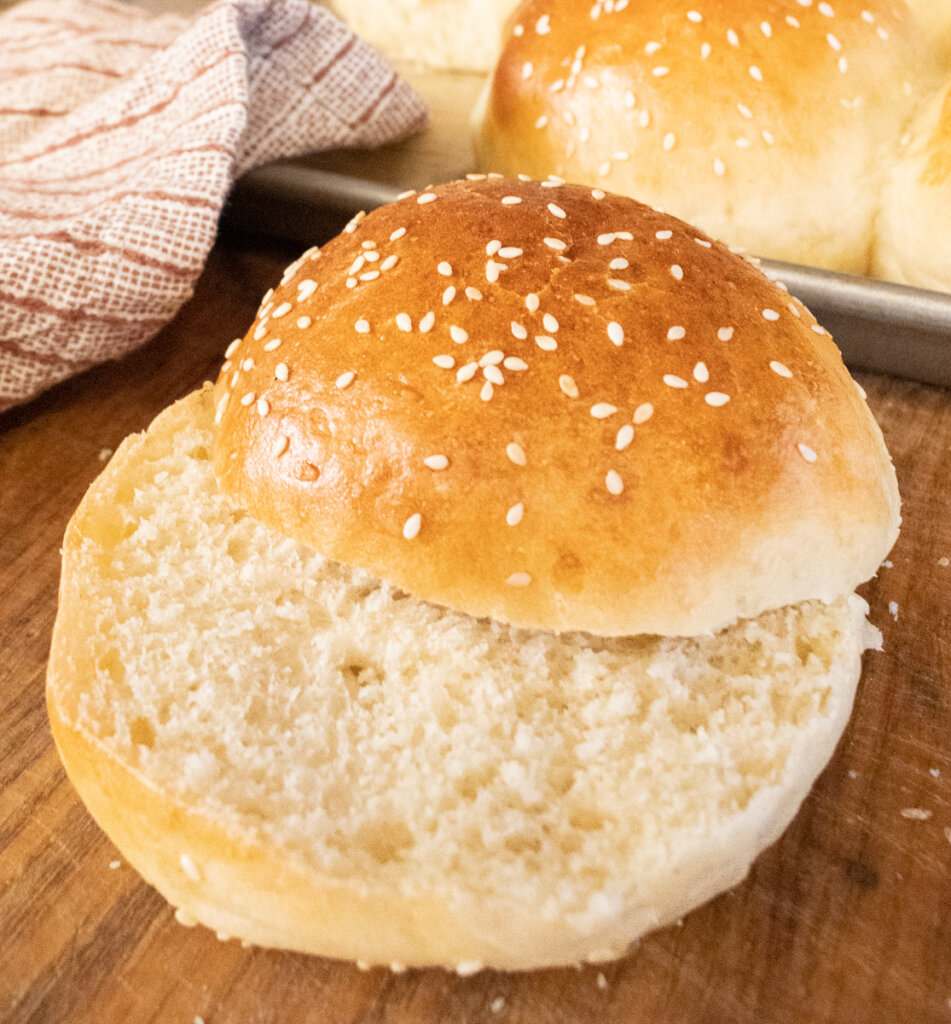 super soft burger bun sliced in half.