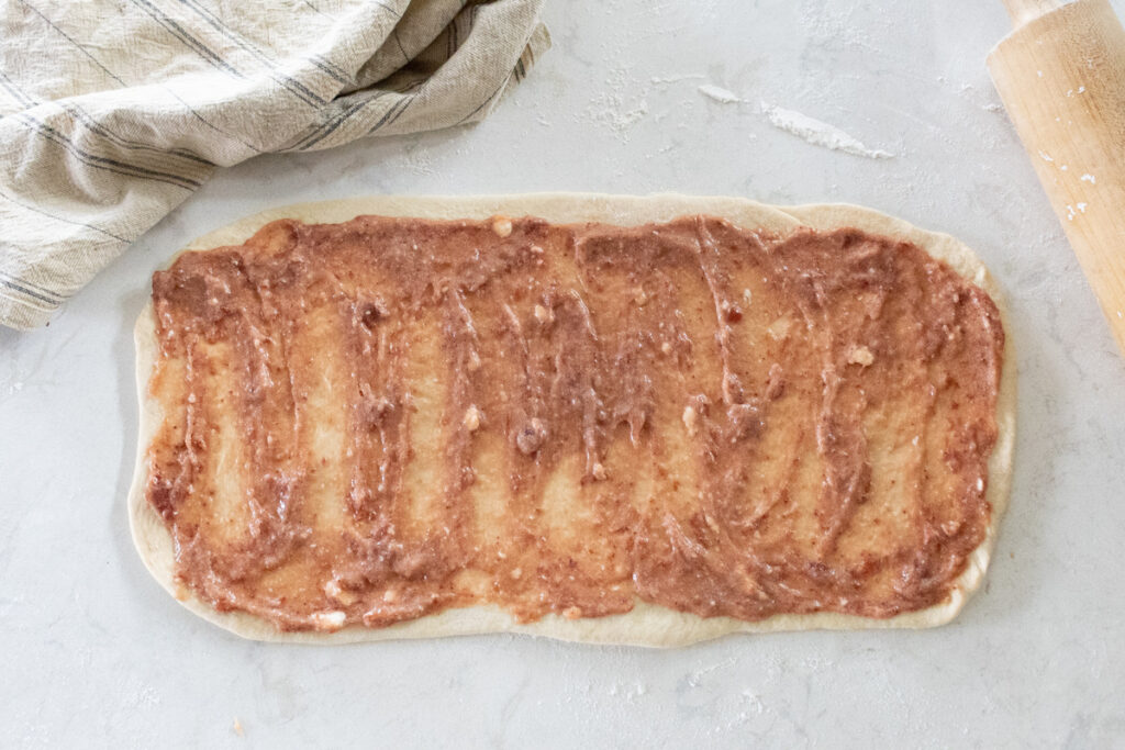 strawberry filling in cinnamon roll dough
