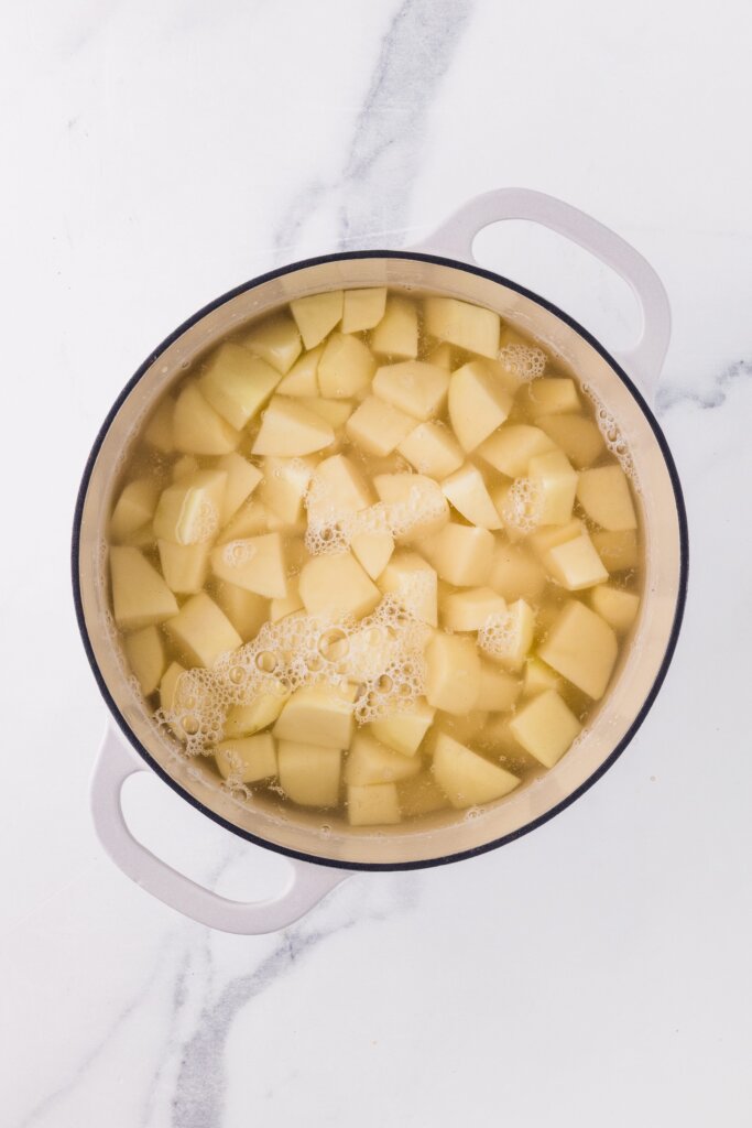 diced potatoes in a boiling water