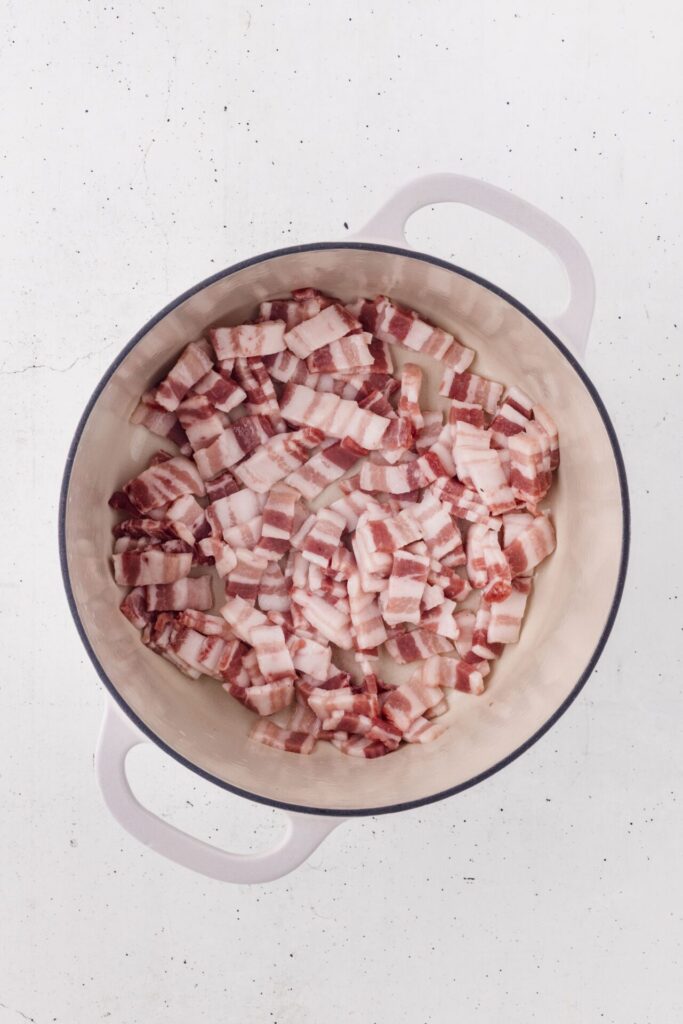 bacon sliced and added to skillet to fry