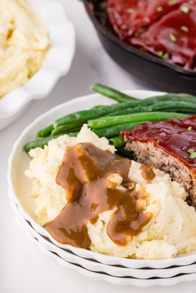 mashed potatoes served with gravy