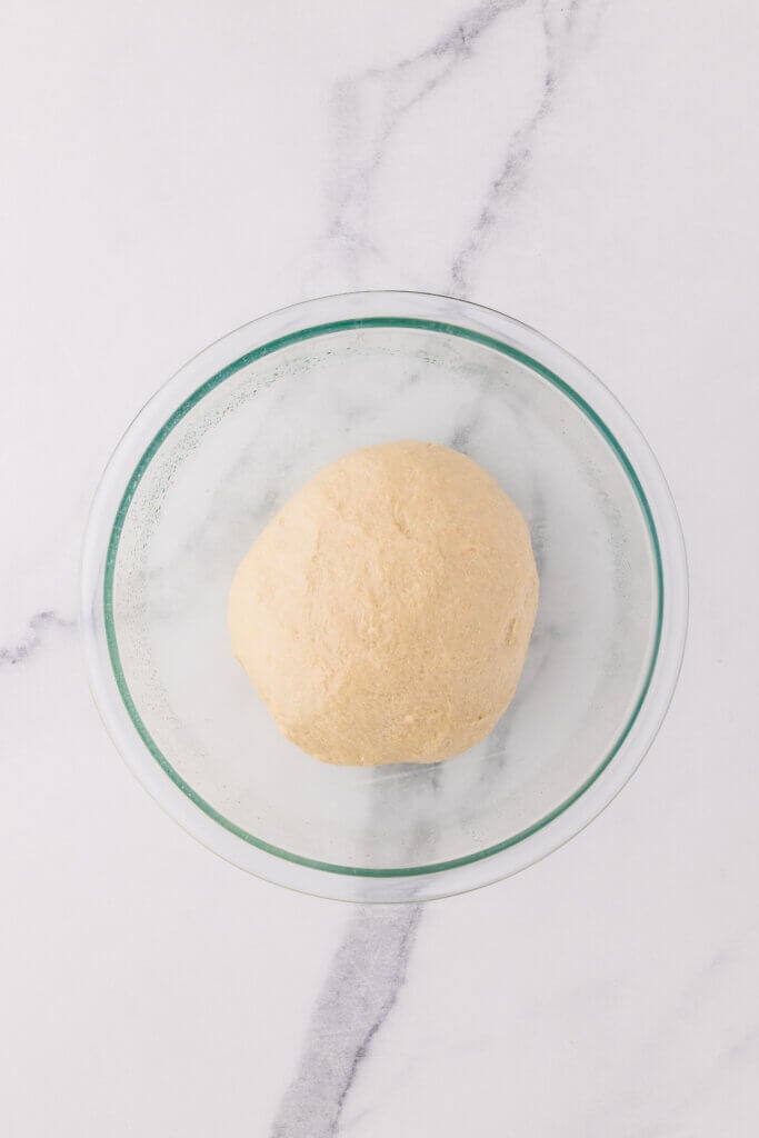 kneaded dough in a bowl