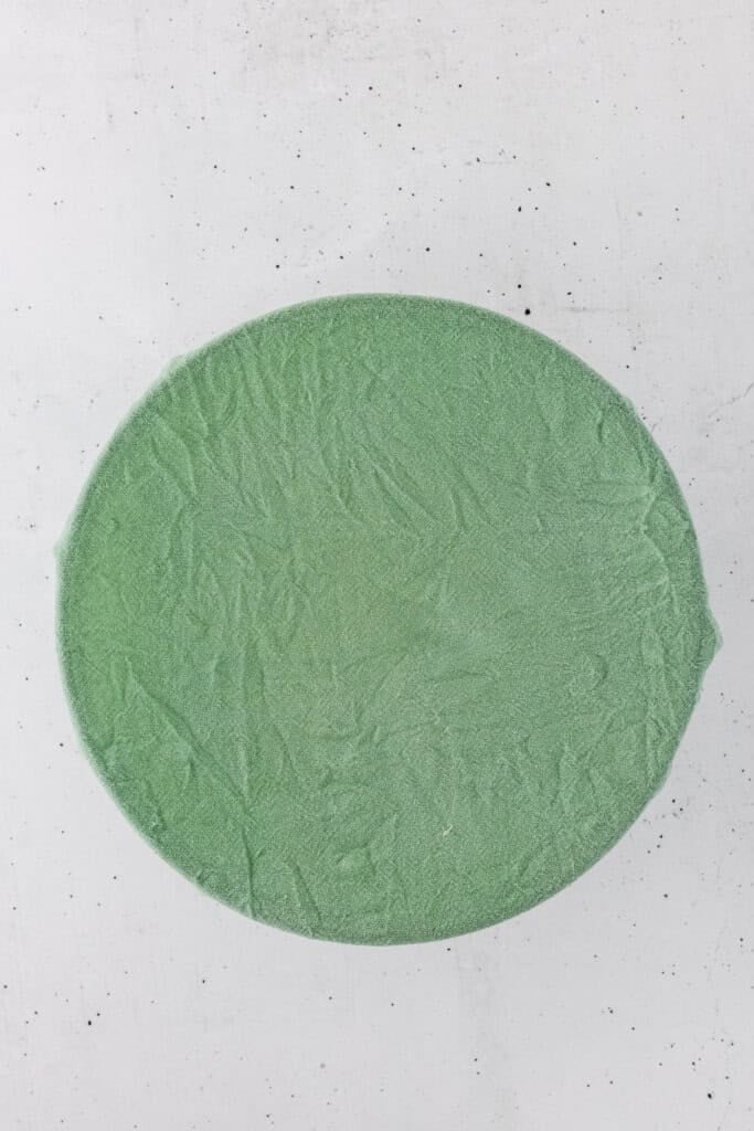 dough covered with towel bulk proofing