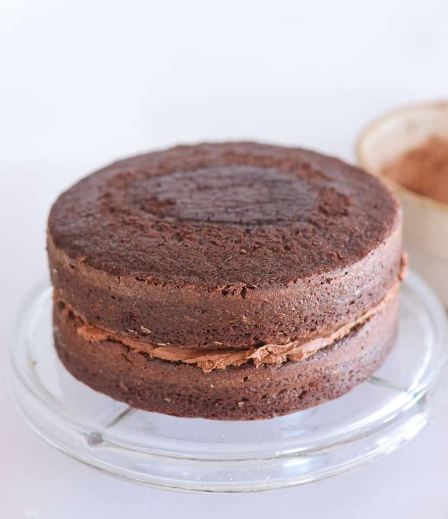 two layer sourdough chocolate cake with icing between layers.
