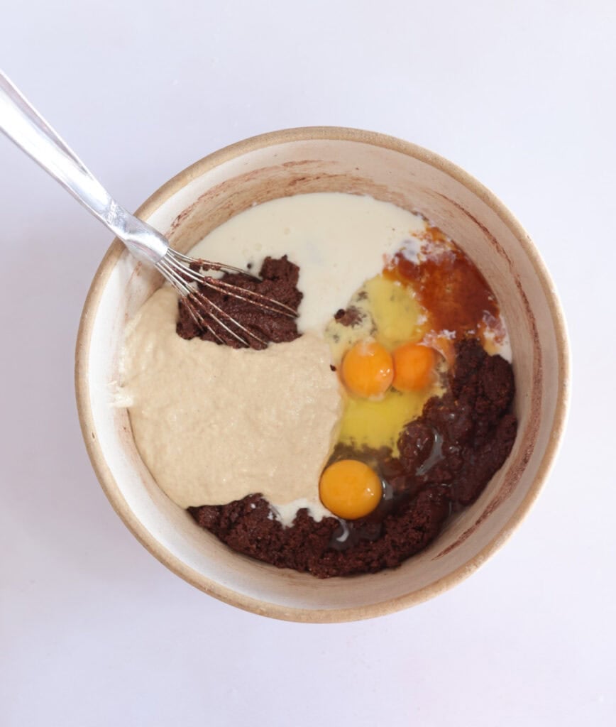 wet ingredients added to sourdough chocolate cake batter.