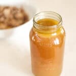 jar of golden chicken bone broth.