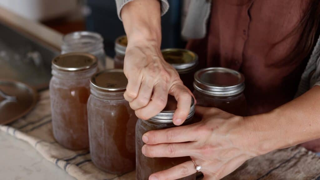 applying lids and rings to jars for pressure canning.