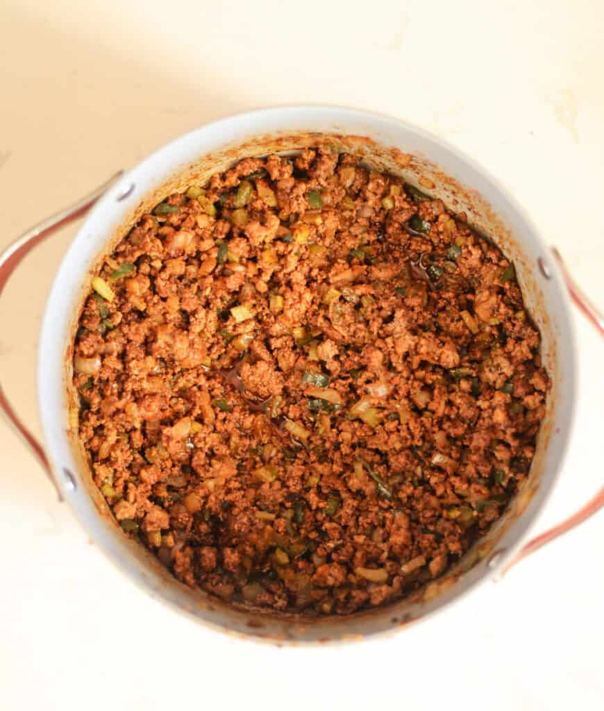 seasonings stirred into chili base and bloomed.