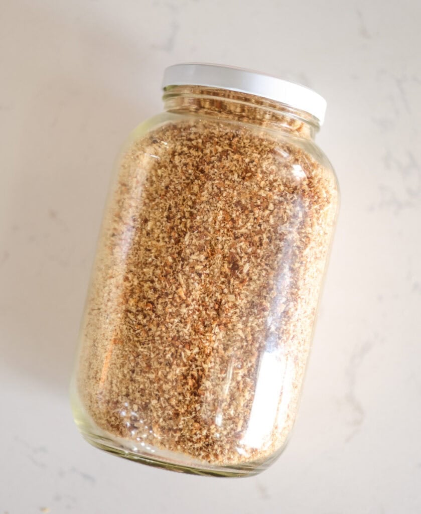 glass jar of sourdough breadcrumbs.