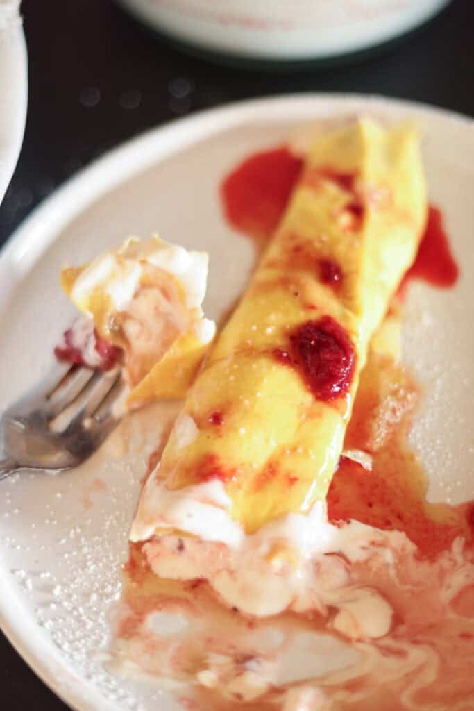egg wrap with strawberries and cream filling.