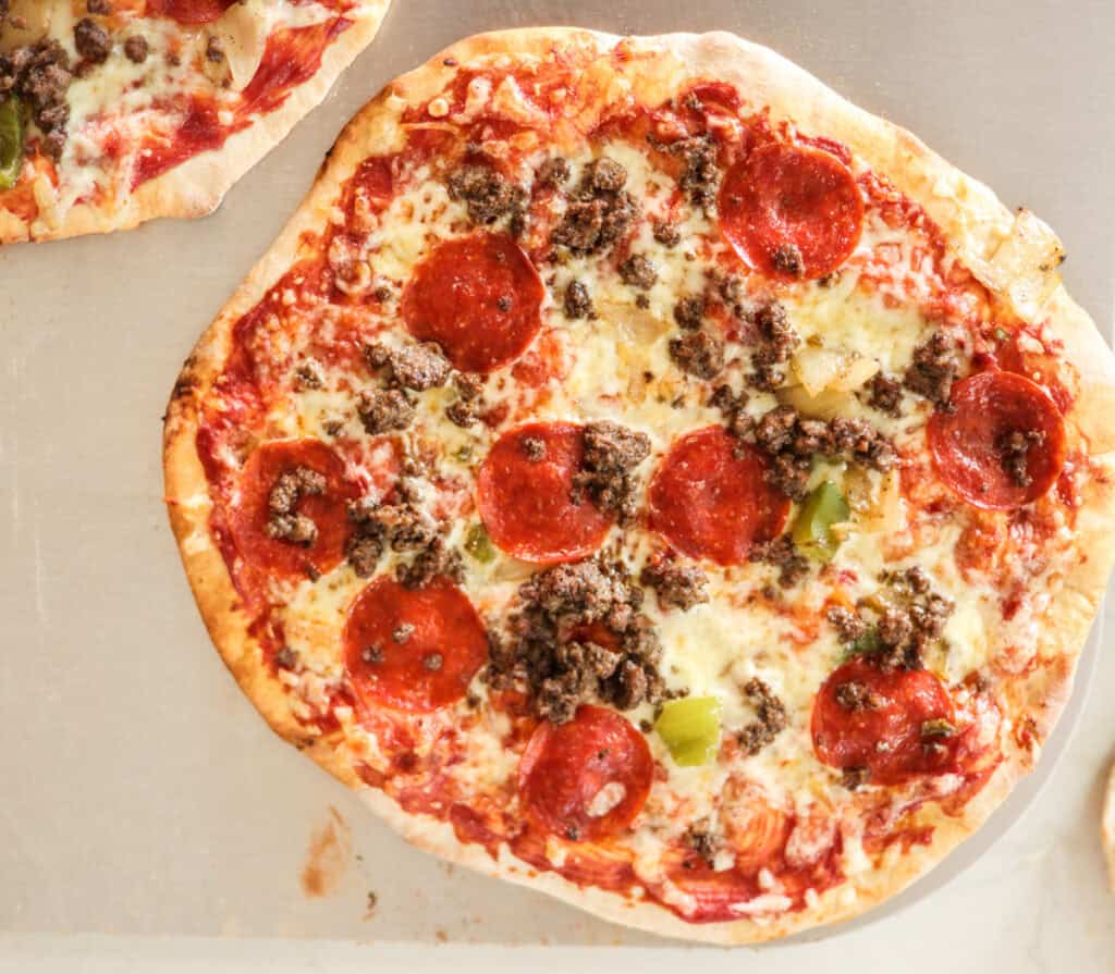 high protein meat lovers pizza with pepperoni and sausage.