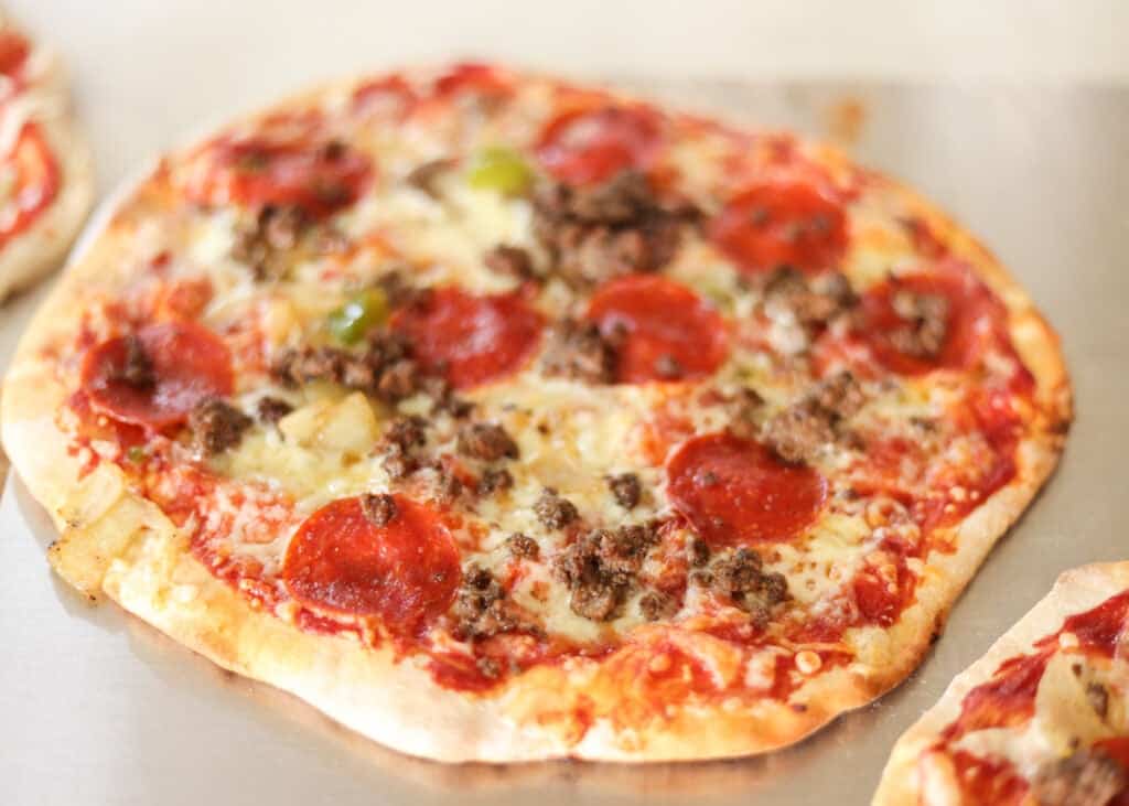 meat lovers pizza made with high protein pizza crust.